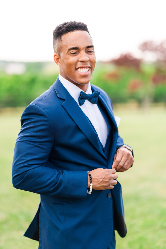 groom solo portraits with blue suit